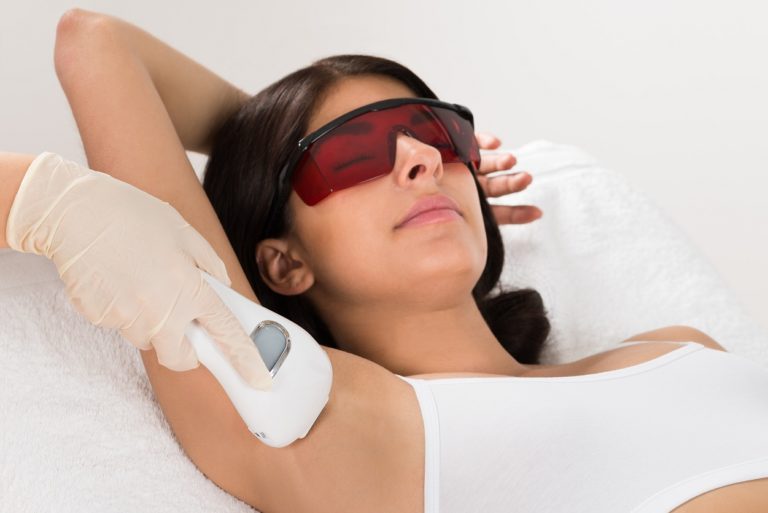 Young Woman Receiving Epilation Laser Treatment